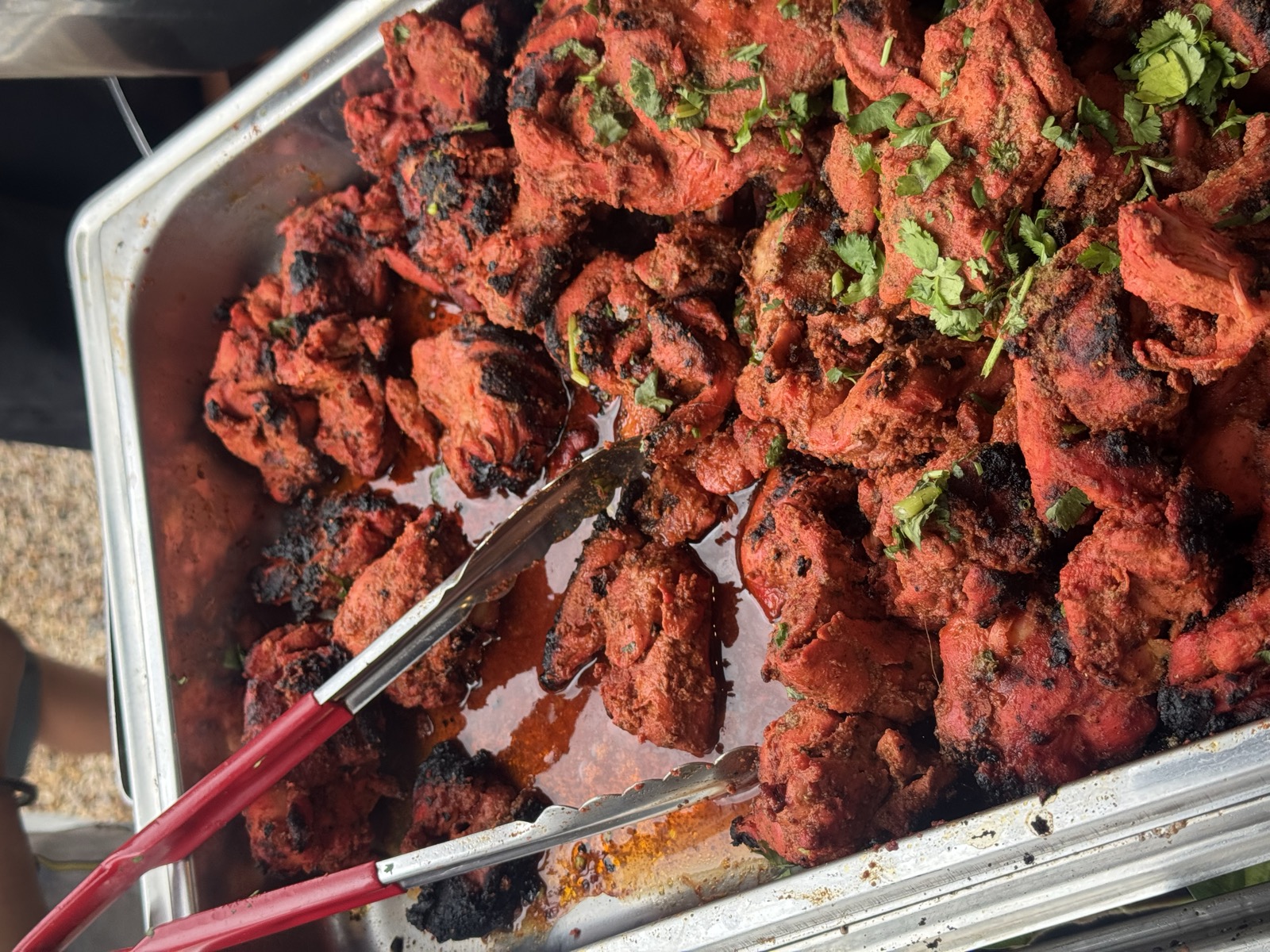 Tandoori chicken cooked over the open fire